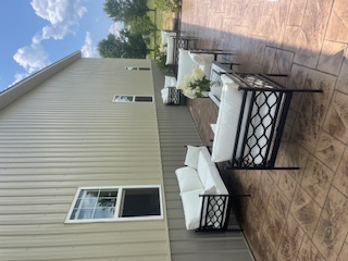 Stamped patio with outdoor furniture