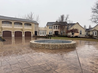 Stamped driveway with fountain