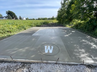 Finished slab with custom W logo